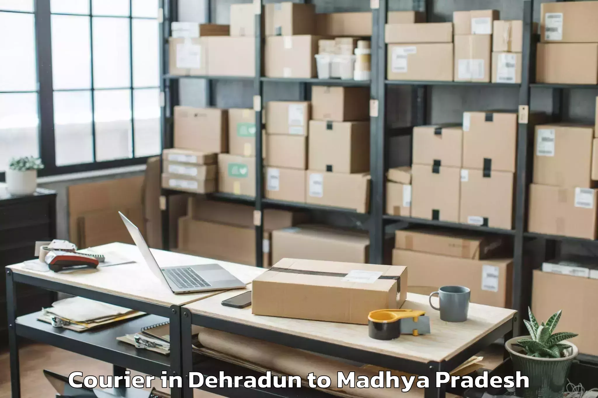 Top Dehradun to Dhar Courier Available